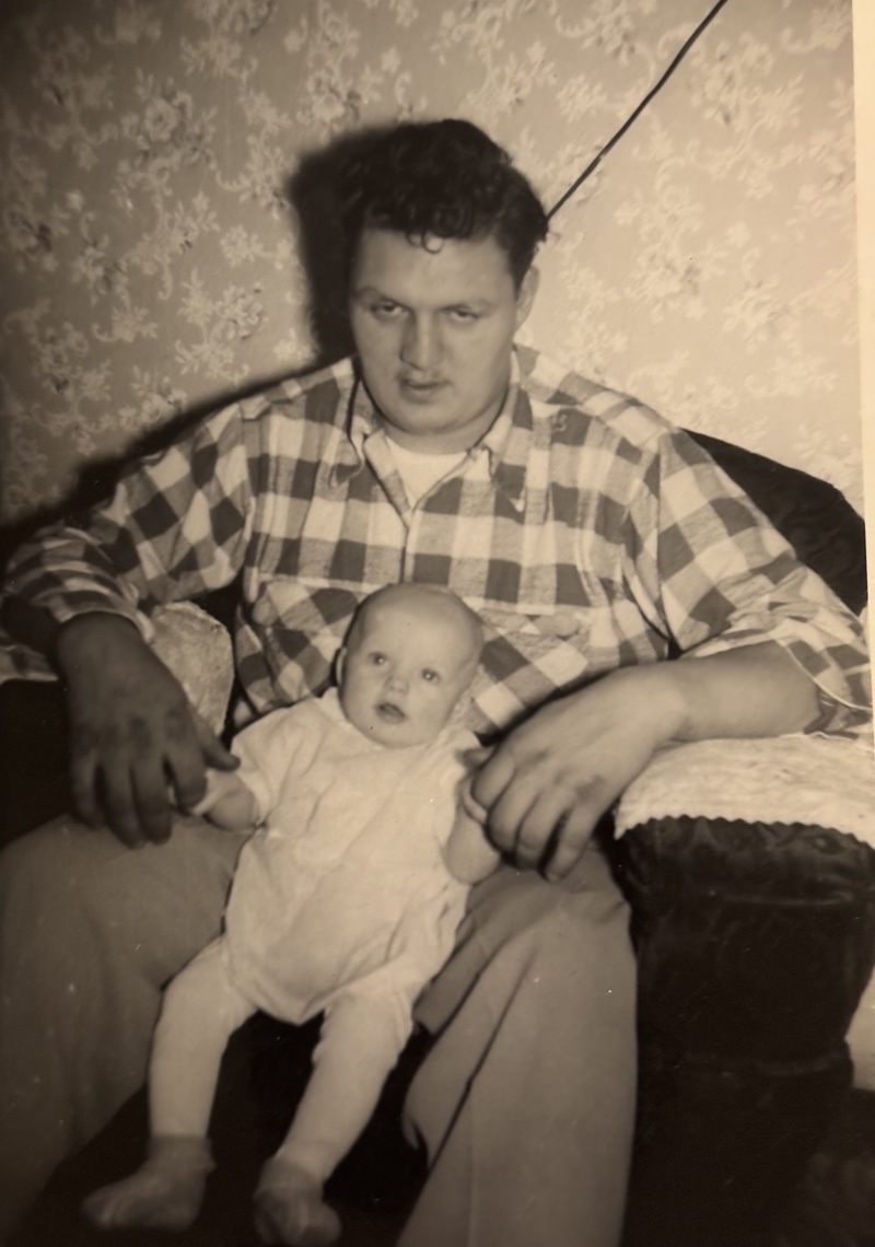 Father holding his infant daughter